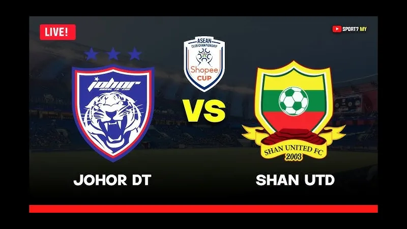 Cầu thủ Johor DT cản phá đường bóng của Shan Utd